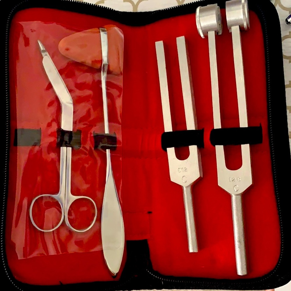 Tuning forks, reflex hammer and medical scissors!